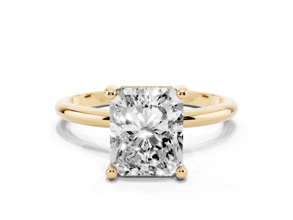 Radiant Cut Solitaire Diamond Ring with 4-Prong Setting on a Classic Band Yellow gold