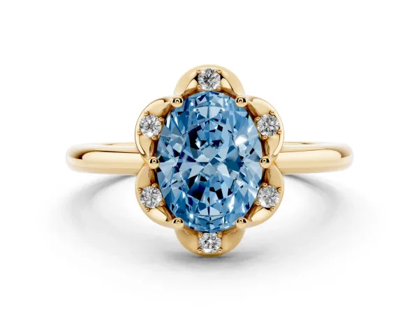 Fancy Blue Oval Cut Halo Diamond Ring with Round Cluster Setting, Solitaire Band, and Four-Prong Setting Yellow gold