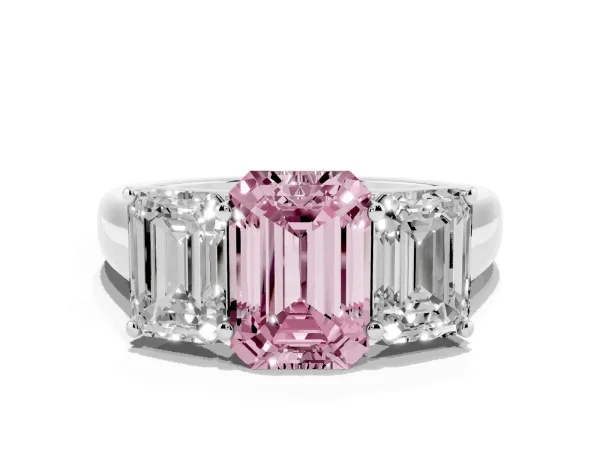 Fancy Pink Emerald Cut Three-Stone Diamond Ring with Prong Setting on a Classic Band Platinum