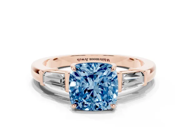 Fancy Blue Cushion Cut Diamond Three-Stone Ring with Tapered Baguette Side Stones and Prong Setting Rose gold