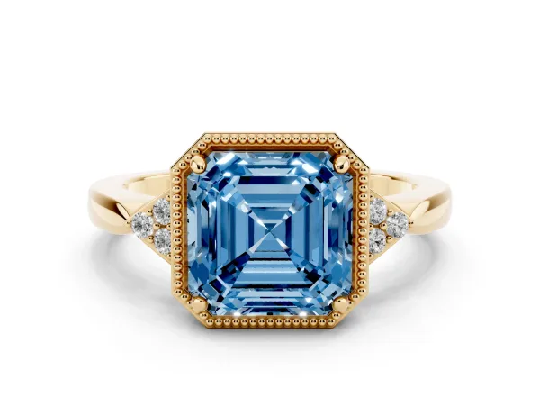 Fancy Blue Milgrain Asscher Cut Cut Diamond Ring with Tapered Pave Band and Four Prong Setting Yellow gold