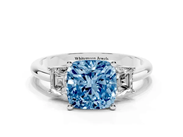 Fancy Blue Cushion Cut Diamond Three-Stone Ring with Trapezoid Side Stones and Prong Setting Platinum