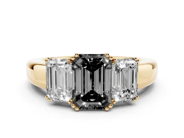 Fancy Black Three-Stone Emerald Cut Cut Diamond Ring with Channel Set Band and Four-Prong Setting Yellow gold