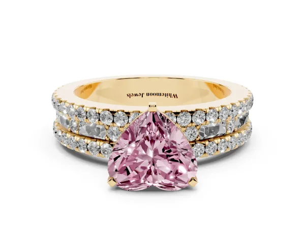 Fancy Pink Heart Cut Diamond Solitaire Ring with Pavé and Channel Set Band Yellow gold