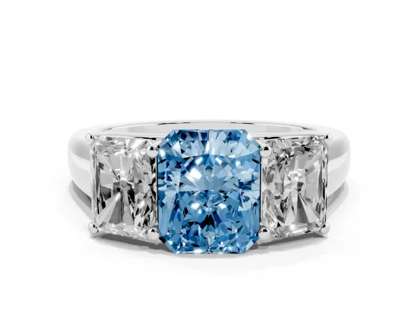 Fancy Blue Radiant Cut Three-Stone Diamond Ring with Prong Setting on a Classic Band Platinum