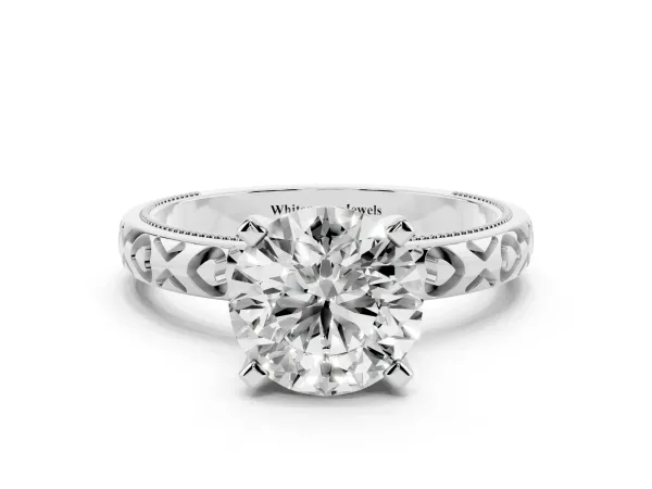 Round Cut Solitaire Diamond Engagement Ring with XO Engraved Band and Four-Prong Setting Platinum