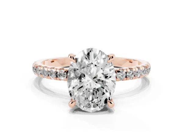 Oval Cut Diamond Brilliant Solitaire Ring with Pavé Band and Four-Prong Setting Rose gold