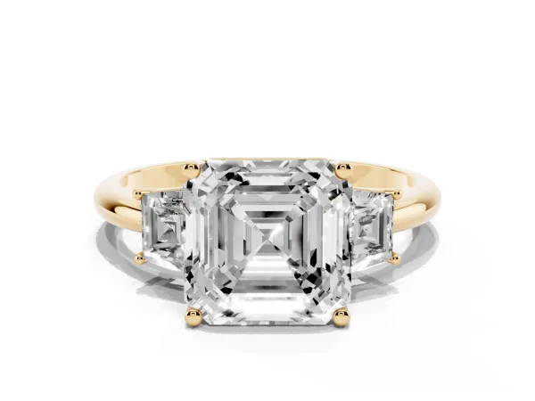 Asscher Cut Diamond Three-Stone Ring with Trapezoid Side Stones and Prong Setting Yellow gold