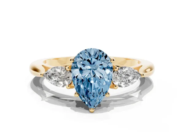 Fancy Blue Three-Stone Pear Cut Brilliant Diamond Solitaire Ring with Tapered Band and Four-Prong Setting Yellow gold