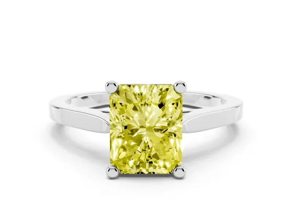 Fancy Yellow Radiant Cut Solitaire Diamond Ring with Four-Prong Setting and Tapered Band Platinum