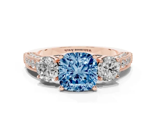 Fancy Blue Cushion Cut Three-Stone Diamond Ring with Pavé Band and Four-Prong Setting Rose gold