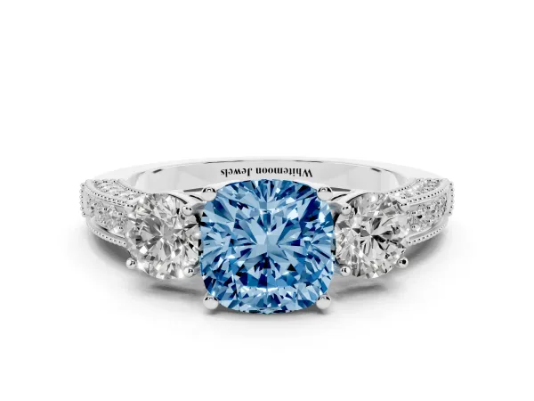 Fancy Blue Cushion Cut Three-Stone Diamond Ring with Pavé Band and Four-Prong Setting White gold