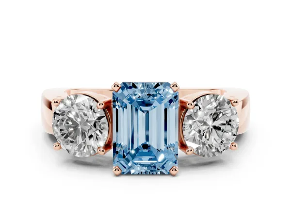 Fancy Blue Three-Stone Emerald Cut Diamond Ring with Round Side Stones, Classic Band, and Four-Prong Setting Rose gold