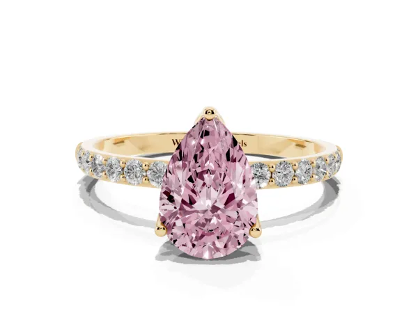 Fancy Pink Pear Cut Diamond Solitaire Engagement Ring with Round Pavé Band and Prong Setting Yellow gold