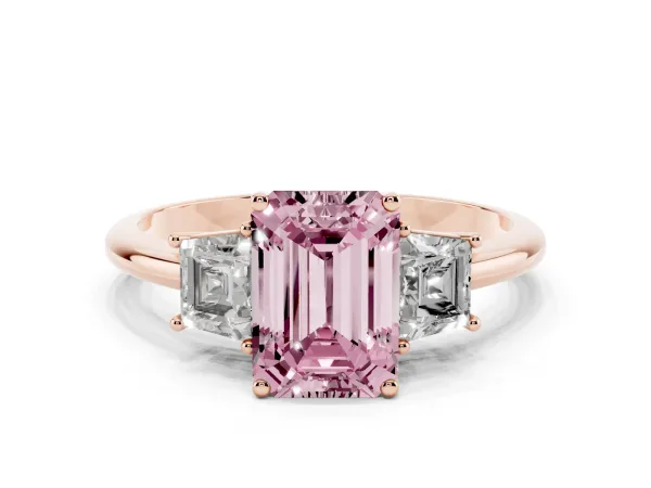 Fancy Pink Emerald Cut Diamond Three-Stone Ring with Trapezoid Side Stones and Prong Setting Rose gold