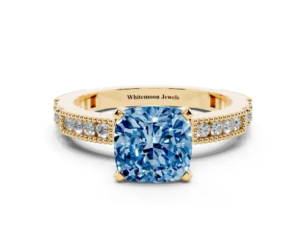 Fancy Blue Cushion Cut Solitaire with Pavé Band and Four-Prong Setting Yellow gold