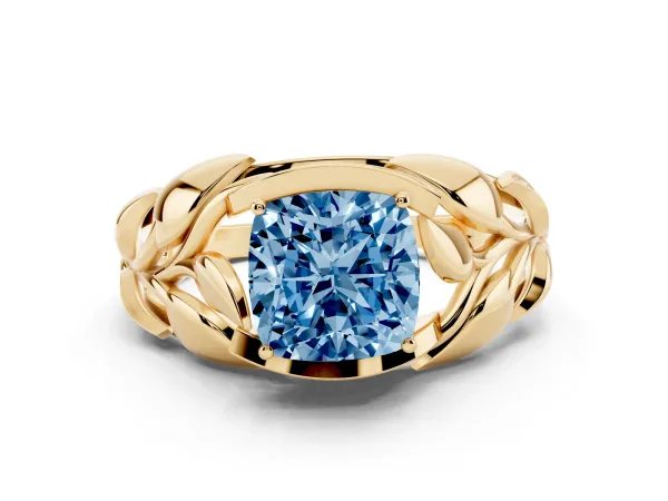 Fancy Blue Cushion Cut Diamond Leaf-Inspired Engagement Ring with Round Accents and Prong Setting Yellow gold