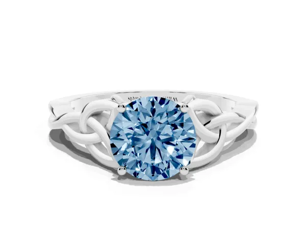Fancy Blue Round Cut Diamond Solitaire Engagement Ring with Celtic Knot Band and Four-Prong Setting Platinum