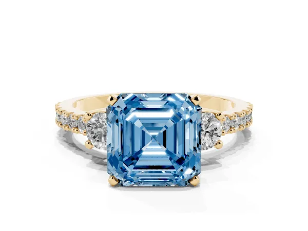 Fancy Blue Asscher Cut Three-Stone Diamond Pavé Band with Prong Setting Yellow gold