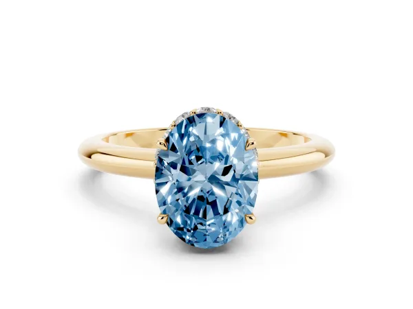 Fancy Blue Oval Cut Brilliant Solitaire Engagement Ring with Six-Prong Setting and Classic Band Yellow gold