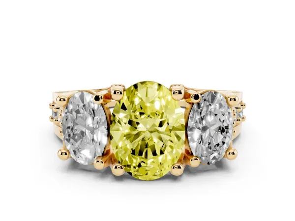 Fancy Yellow Oval Cut Diamond Three-Stone Ring with Channel Set Band and Four-Prong Setting Yellow gold