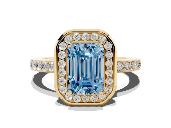 Fancy Blue Emerald Cut Diamond Halo Ring with Bezel Frame and Pavé Band Yellow gold
