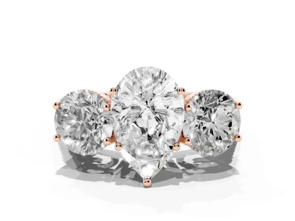 Three-Stone Pear Cut Diamond Engagement Ring with Prong Setting on a Classic Band Rose gold
