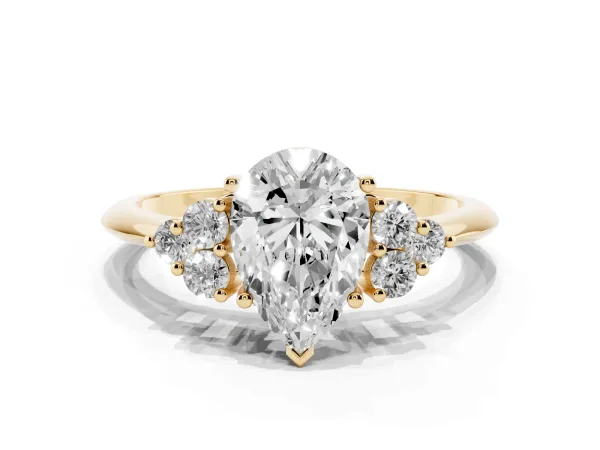 Pear Cut Cut Diamond Cluster Ring with Solitaire Band and Four-Prong Setting Yellow gold