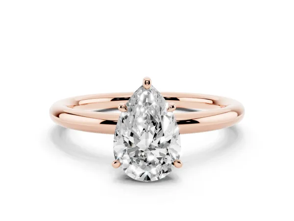Pear Cut Solitaire Diamond Ring with Four-Prong Setting on a Plain Band Rose gold