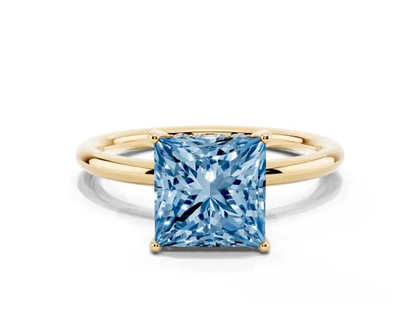 Fancy Blue Princess Cut Solitaire Diamond Ring with a Classic Band and Four-Prong Setting Yellow gold