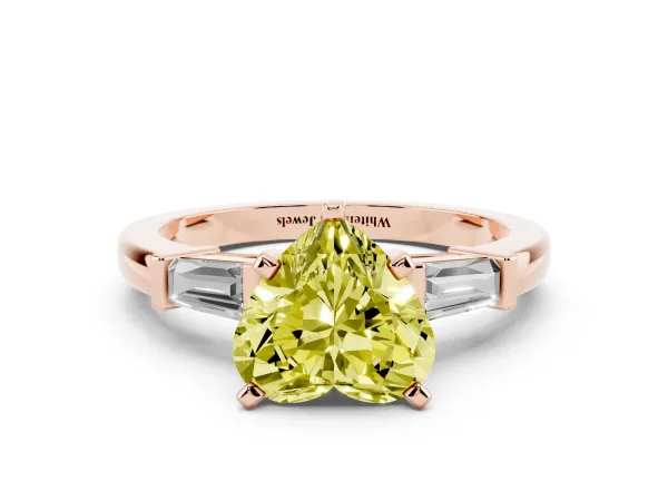 Fancy Yellow Heart Cut Cut Diamond Solitaire Ring with Tapered Baguette Accents and Four-Prong Setting Rose gold