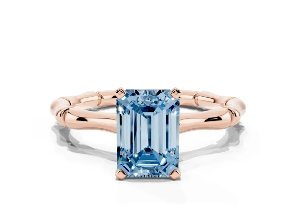 Fancy Blue Emerald Cut Solitaire Diamond Ring with Bamboo Band and Four-Prong Setting Rose gold