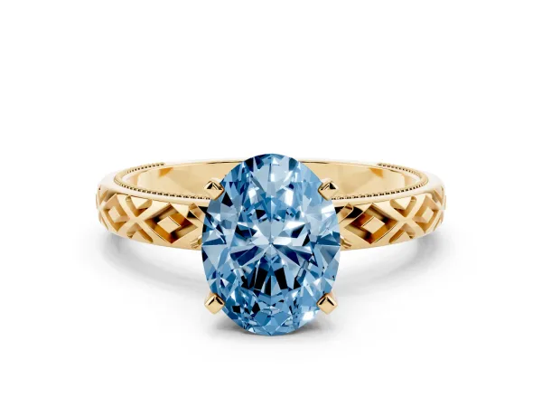 Fancy Blue Oval Cut Solitaire Diamond Ring with Milgrain and Black Enamel X Pattern Band Yellow gold