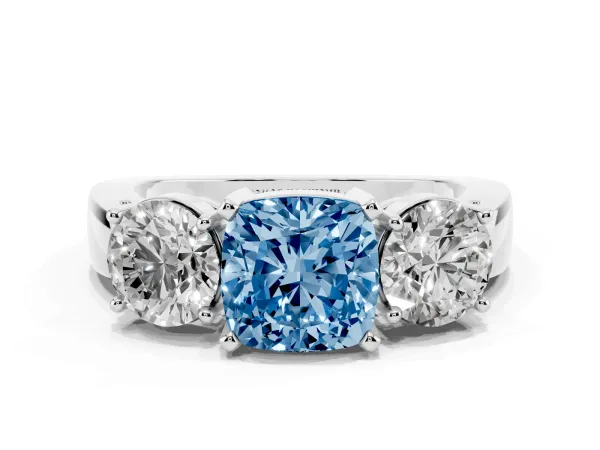 Fancy Blue Three-Stone Cushion Cut Diamond Ring with Round Side Stones, Classic Band, and Four-Prong Setting Platinum