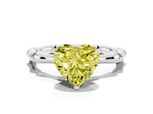Fancy Yellow Heart Cut Solitaire Diamond Ring with Bamboo Band and Four-Prong Setting Platinum