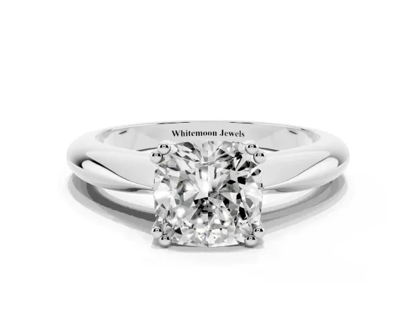 Cushion Cut Cut Solitaire Engagement Ring with Tapered Band and Four-Prong Setting Platinum