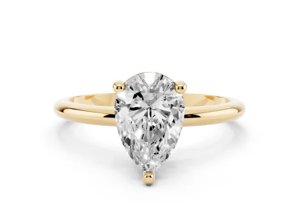 Pear Cut Solitaire Diamond Ring with 4-Prong Setting on a Classic Band Yellow gold