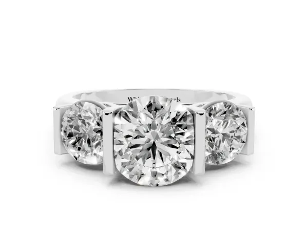 Three-Stone Round Cut Brilliant Diamond Ring with Channel Setting and White Gold Band White gold