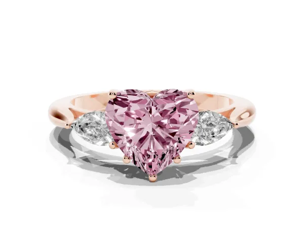 Fancy Pink Three-Stone Heart Cut Diamond Ring with Pear Side Stones in Four-Prong Setting Rose gold