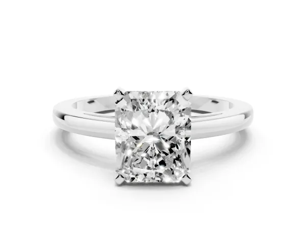 Radiant Cut Solitaire Diamond Engagement Ring with Four-Prong Setting on a Classic Band Platinum