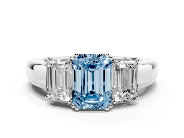 Fancy Blue Three-Stone Emerald Cut Cut Diamond Ring with Channel Set Band and Four-Prong Setting Platinum