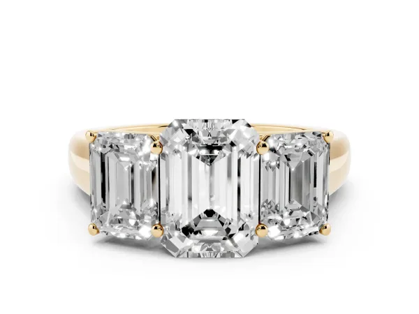 Emerald Cut Three-Stone Diamond Ring with Prong Setting on a Classic Band Yellow gold