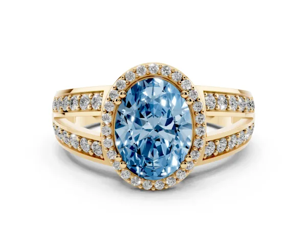 Fancy Blue Oval Cut Diamond Halo Ring with Split Shank Pavé Band and Four-Prong Setting Yellow gold