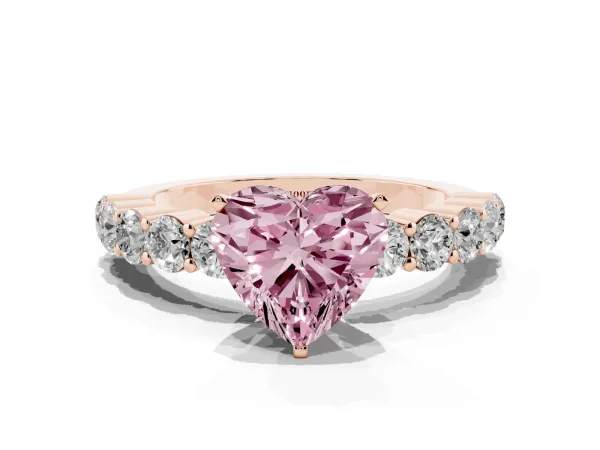 Fancy Pink Heart Cut Diamond Solitaire Ring with Shared Prong Round Side Stones Rose gold