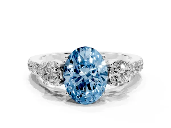Fancy Blue Oval Cut Cut Diamond Three-Stone Ring with Round Side Stones and Pavé Band White gold