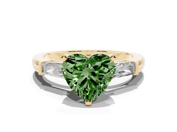 Fancy Green Heart Cut Solitaire with Tapered Baguette Side Stones on a Classic Band with Four-Prong Setting Yellow gold