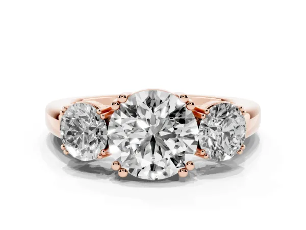 Three-Stone Round Cut Cut Diamond Ring with Channel Set Band and Four-Prong Setting Rose gold