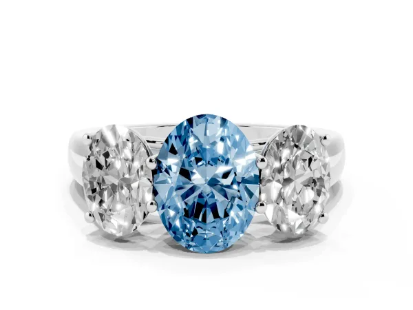 Fancy Blue Oval Cut Three-Stone Diamond Ring with Prong Setting on a Classic Band White gold