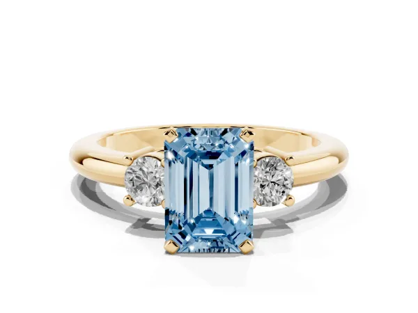 Fancy Blue Three-Stone Emerald Cut Cut Diamond Solitaire with Prong Setting and Classic Band Yellow gold