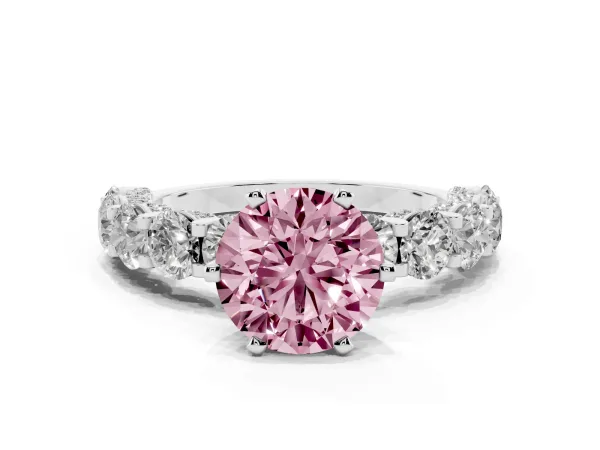 Fancy Pink Round Cut Diamond Side Stone Engagement Ring with Four-Prong Setting Platinum
